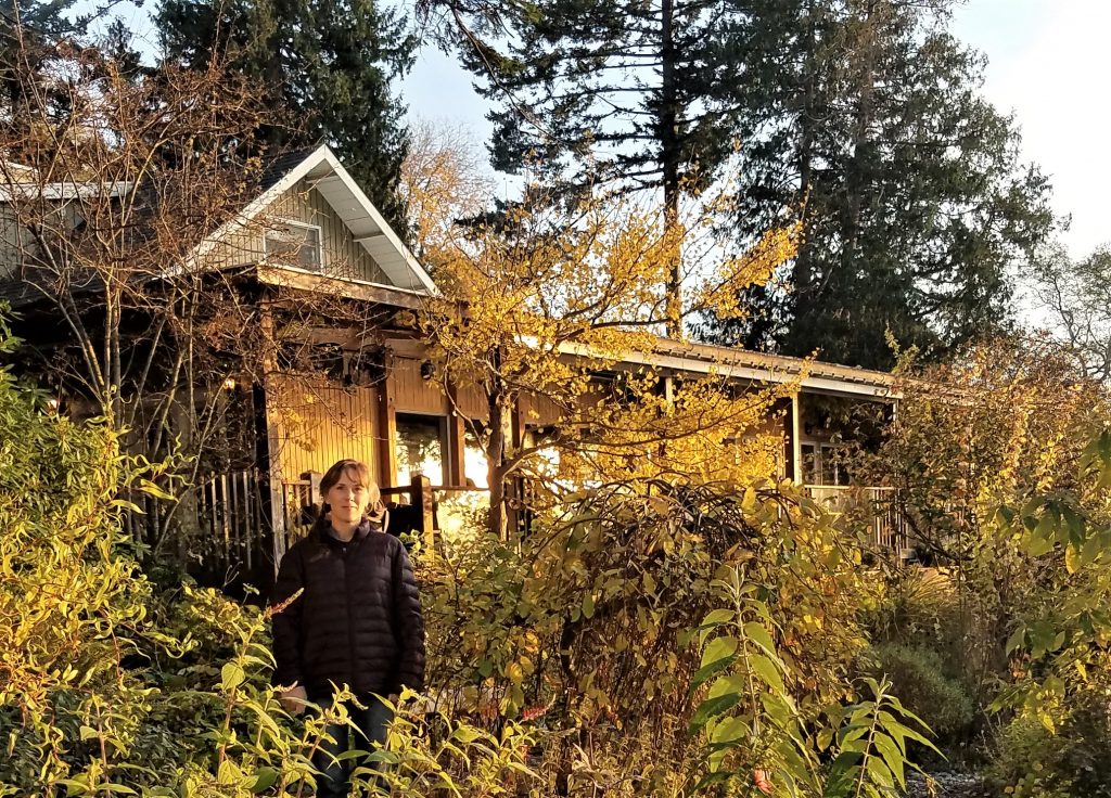 Nichole Schmitt standing outside the west porch at Willows Inn (November 7, 2019). Photo: Nichole Schmitt