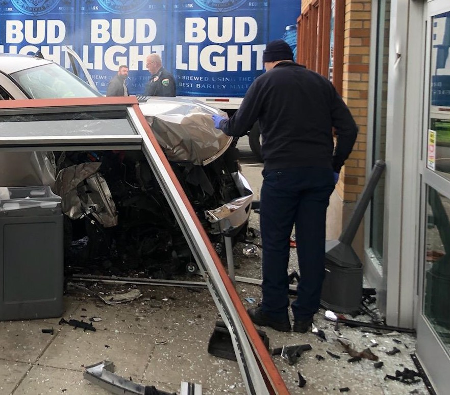 Scene of a 1-car vs building crash at 260 Tobacco & Fine Spirits on Rural Avenue (December 10, 2019). Photo courtesy WCFD7