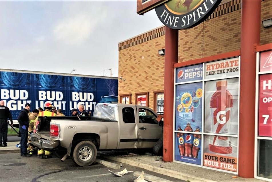 Scene of a 1-car vs building crash at 260 Tobacco & Fine Spirits on Rural Avenue (December 10, 2019). Photo courtesy WCFD7