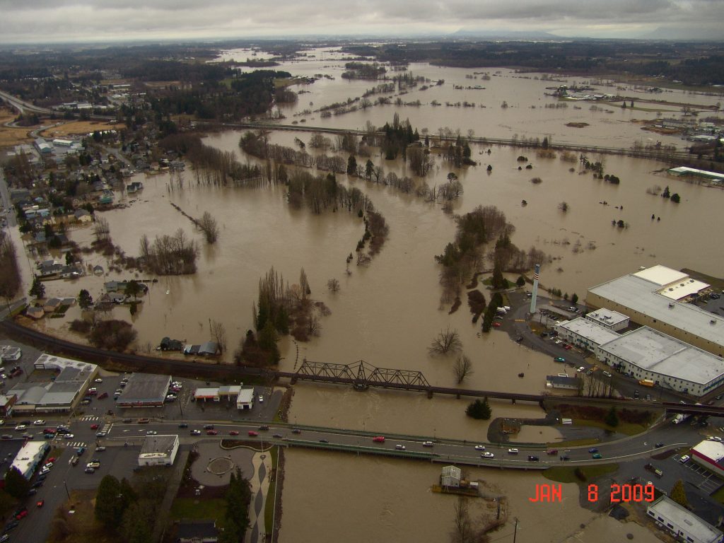 Aerial photo looking north from Pioneer Bridge over the Nooksack River at Main Street (January 8, 2009). WSDOT photo via Flickr  
