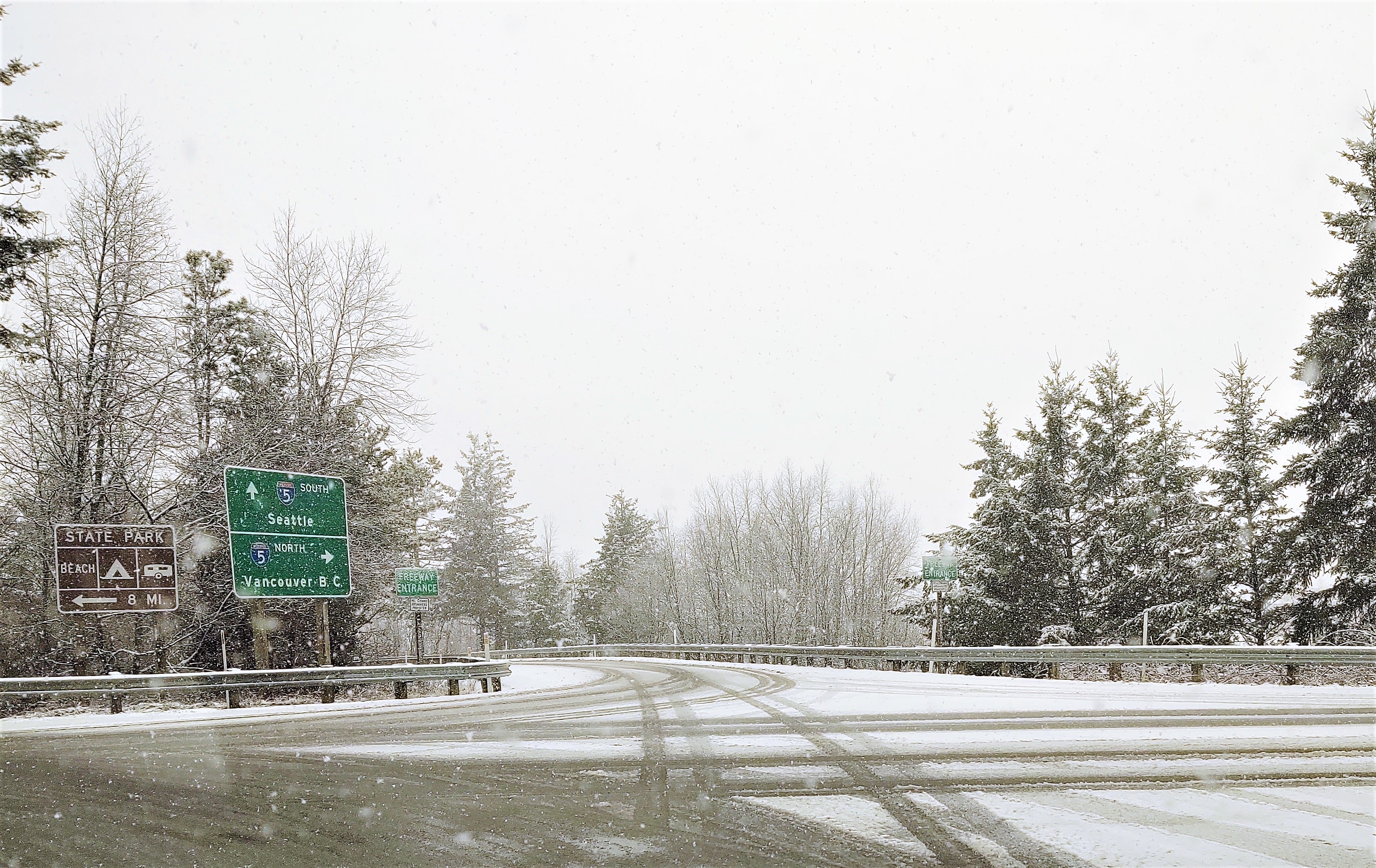 Compact snow and slush can be seen on the roadway at the Grandview Road and I-5 interchange (February 4, 2020). Photo: Whatcom News