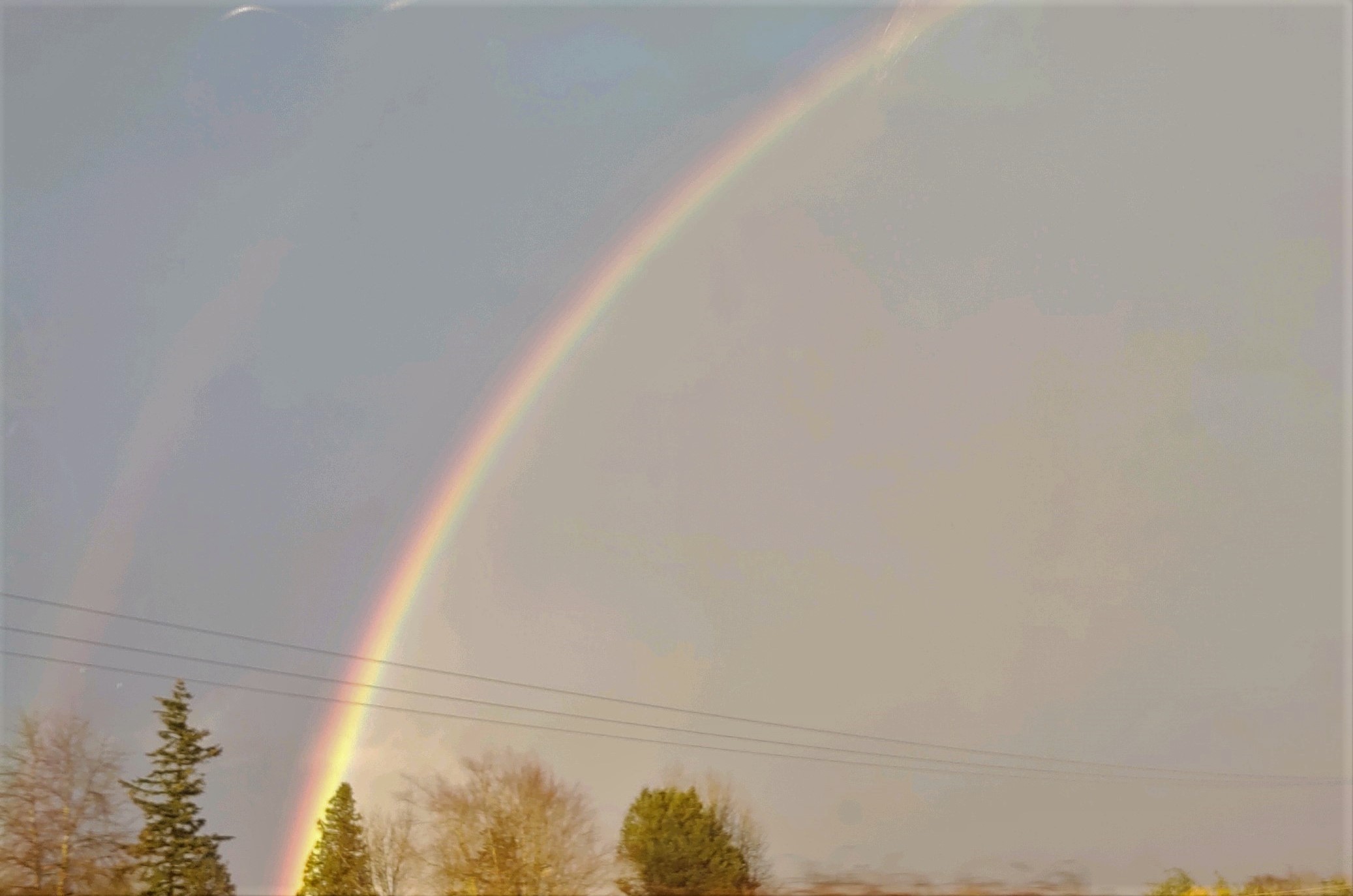 Rainbow off to the east as seen from I-5 at Ferndale (February 28, 2020). Photo courtesy of Patty Beaulaurier