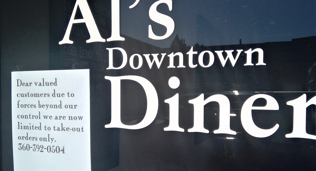 Sign in the window at Al's Downtown Diner announces only take-out orders are available (March 16, 2020). Photo: My Ferndale News