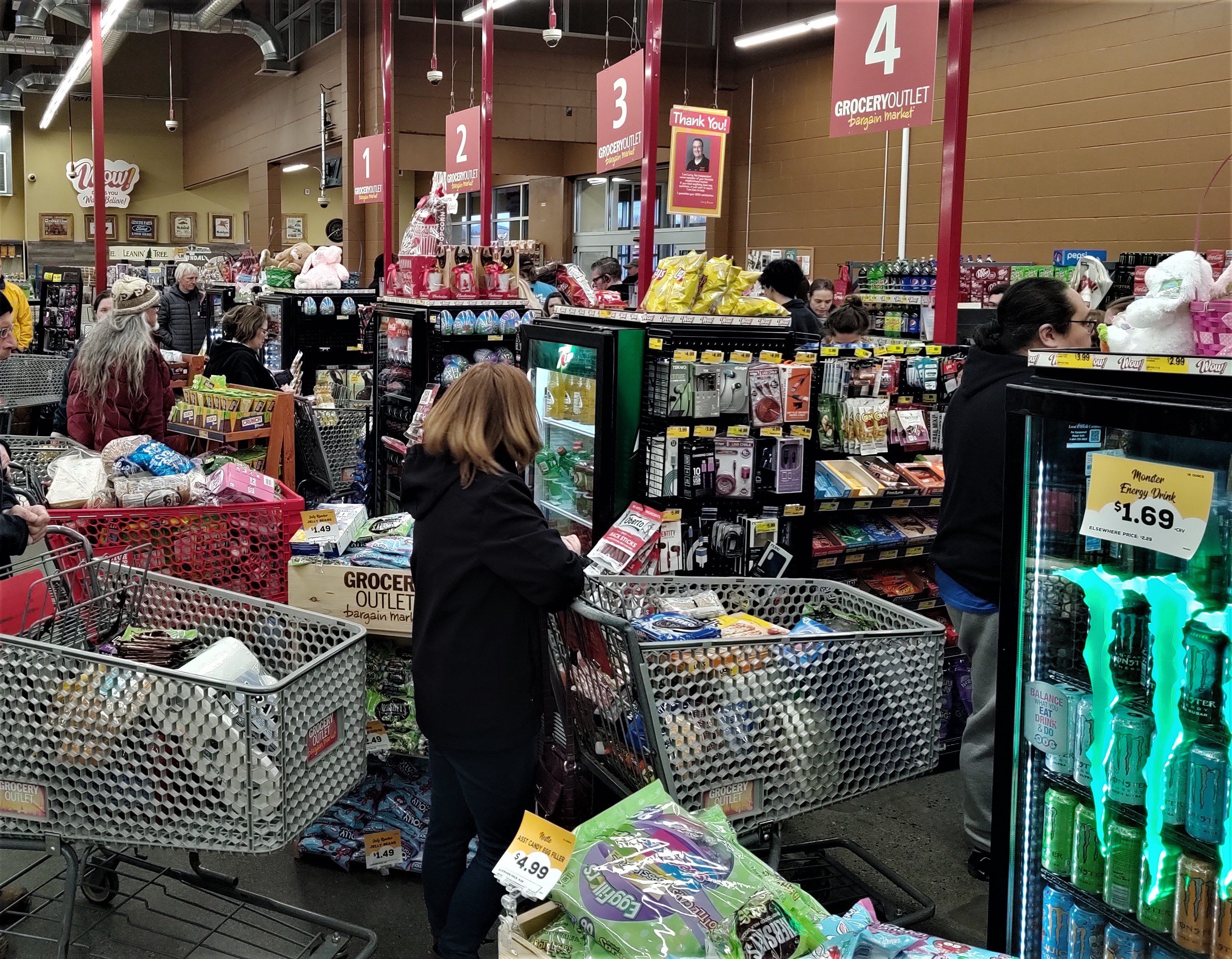 Shoppers wait to check out at Ferndale Grocery Outlet (March 13, 2020). Photo: Whatcom News