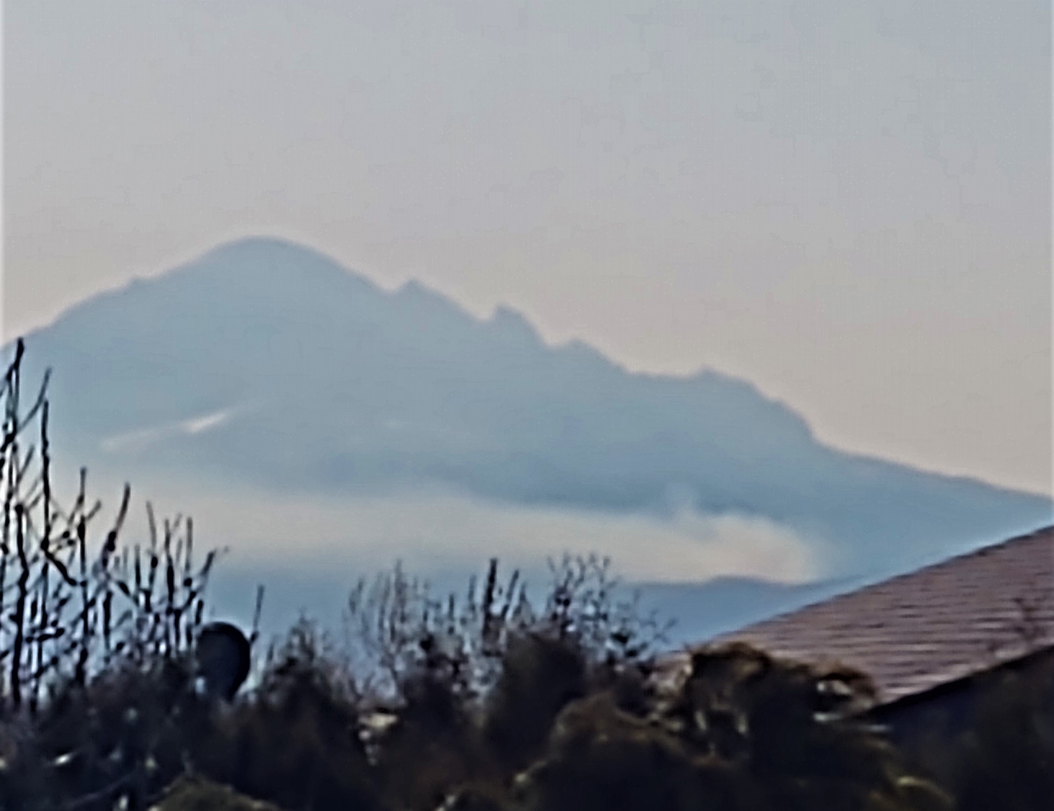 Smoke can be seen from Ferndale in the area of the Porter Creek wildfire in (April 16, 2020) the morning after DNR fire crews had spent the night battling it. Photo: My Ferndale News