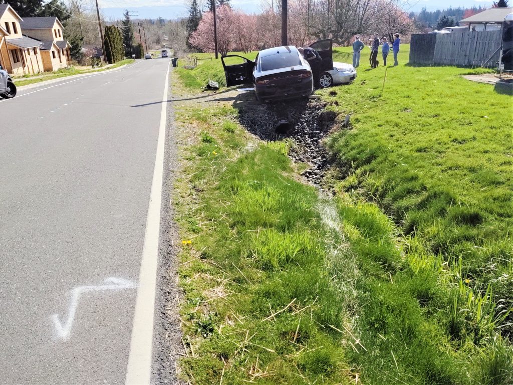 Scene of a car vs parked car crash on Thornton Street near Malloy Avenue (April 6, 2020). Photo: My Ferndale News