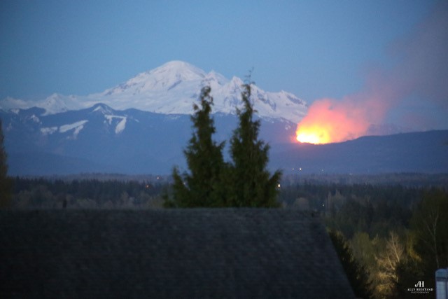 Fire in foothills of Mt Baker as viewed from Ferndale (April 15, 2020). Photo courtesy of Ally Hiestand