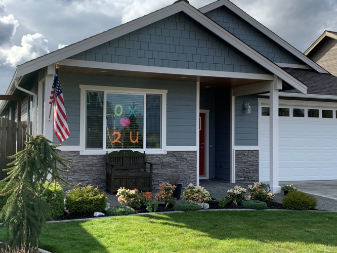 Sign in a Ferndale home window to the increased number of pedestrians during the "Stay Home, Stay Healthy" order to minimize the spread of the COVID-19 disease (April 2, 2020). Photo courtesy of Barbara Ingram