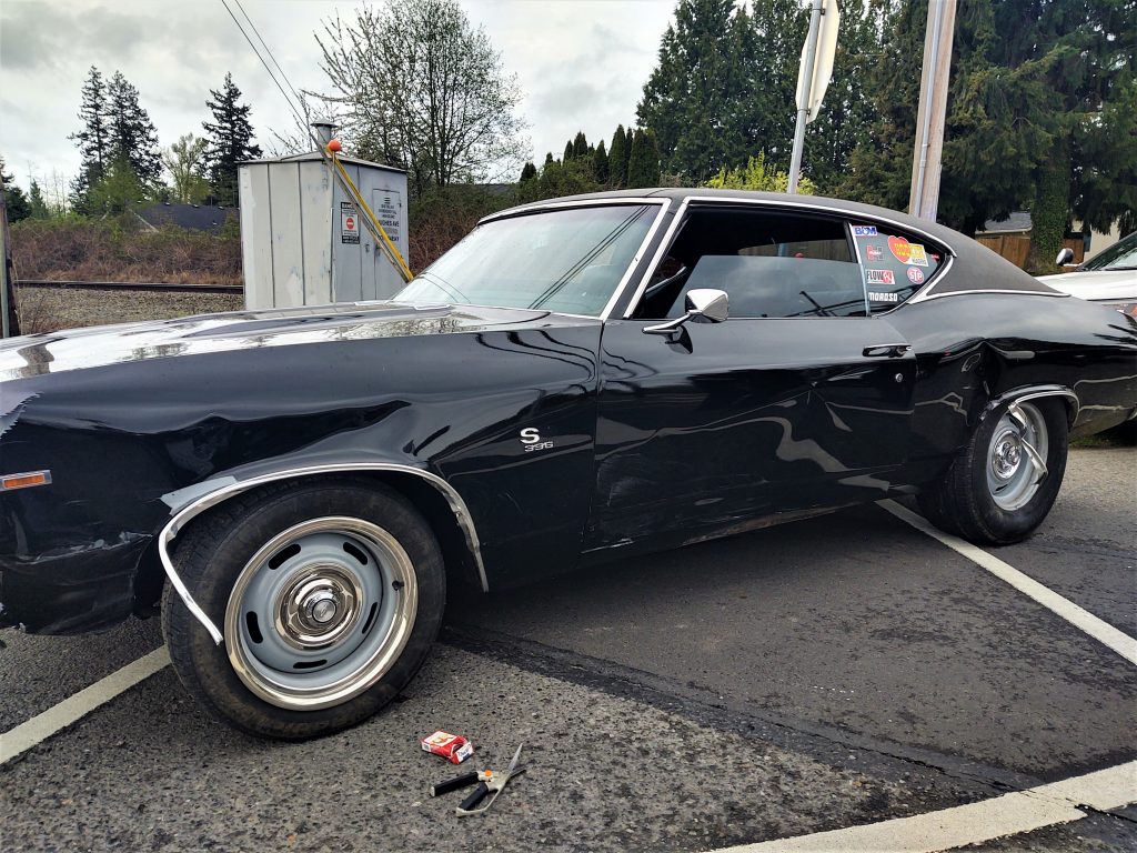 Left side of reported stolen car after colliding with at least 1 civilian vehicle and a pit maneuver stopped it in Blaine (April 19, 2020). Photo: My Ferndale News