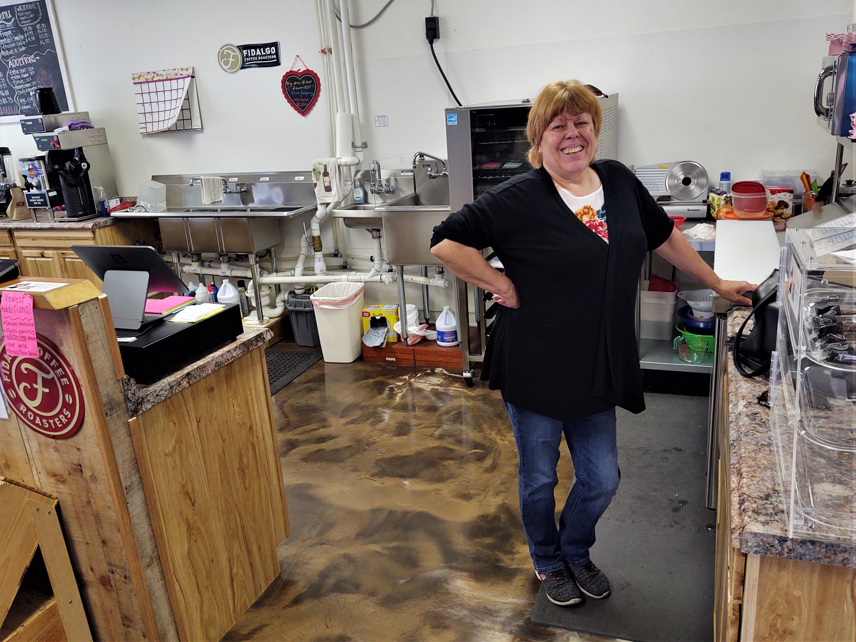 Owner Rhonda Wright poses inside The Meeting Place while she prepares to reopen after being closed for nearly a month due to the COVID-19 crisis (May 16, 2020). Photo: My Ferndale News