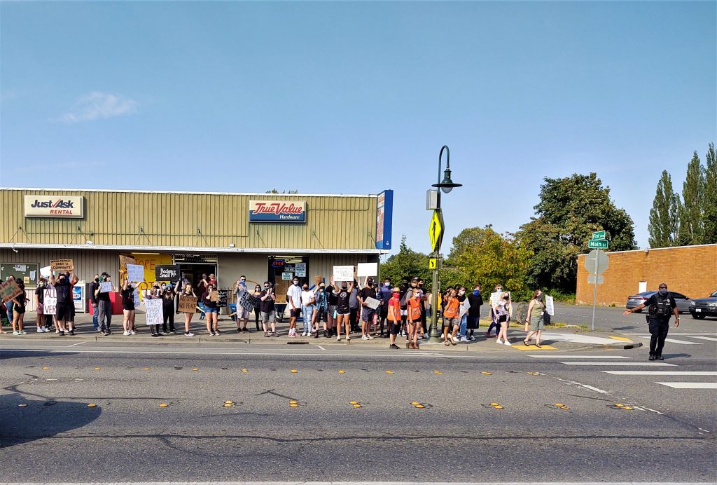 Black Lives Matter rally participants wait before being allowed to cross Main Street at 1st Avenue during their march through downtown (July 31, 2020). Photo: My Ferndale News