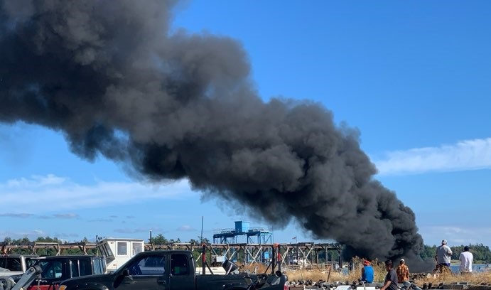 Boat fire on beach at Gooseberry Point (August 18, 2020). Photo courtesy of Barbara Craig