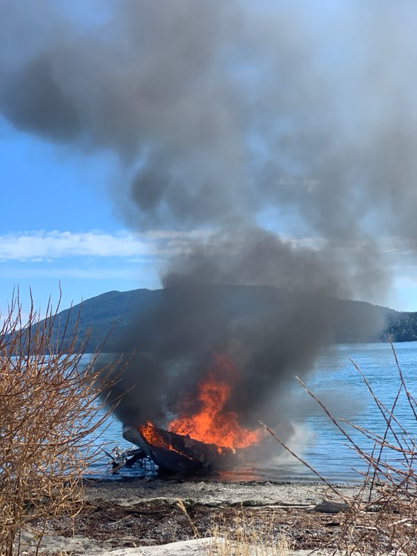 Boat fire on beach at Gooseberry Point (August 18, 2020). Photo courtesy of Barbara Craig