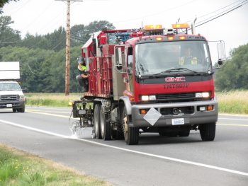 Whatcom County Public Works crew applies fresh striping to Slater Road (August 8, 2019). Photo: My Ferndale News