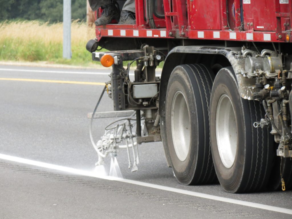 Whatcom County Public Works crew applies fresh striping to Slater Road (August 8, 2019). Photo: Whatcom News