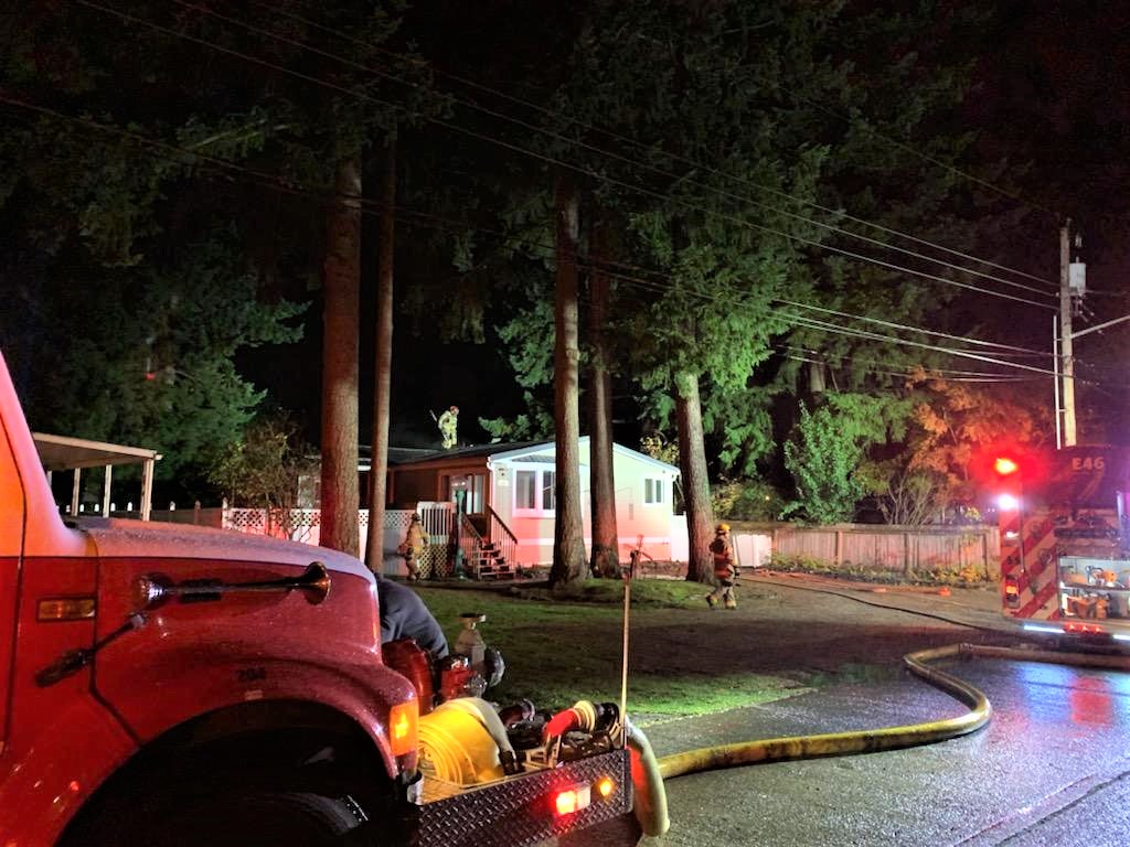 WCFD7 firefighters mop up after a residential fire on Tall Cedars Lane (November 19, 2020). Photo courtesy of WCFD7