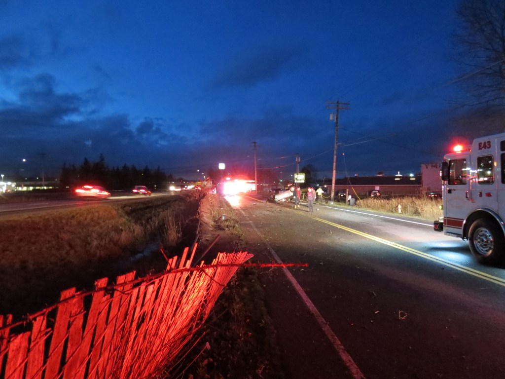 Scene of a rollover crash involving a passenger vehicle that was northbound on I-5 and ended up on its top on Barrett Road (December 17, 2020). Photo: My Ferndale News