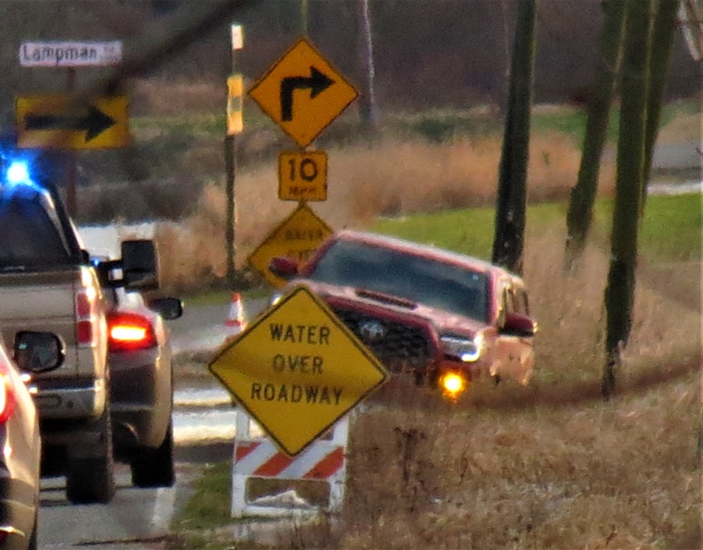 Vehicle seen off the road after driving past "Road Closed" signs in place due to water over the roadway on S Church Road (January 14, 2021). Photo: Whatcom News