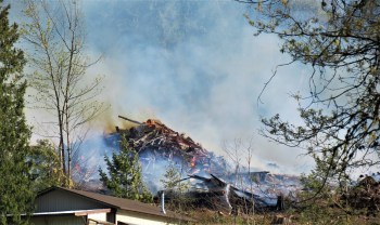 Scene of an outside fire in the 3100 block of Mt Baker Highway (April 18, 2021). Photo: Whatcom News