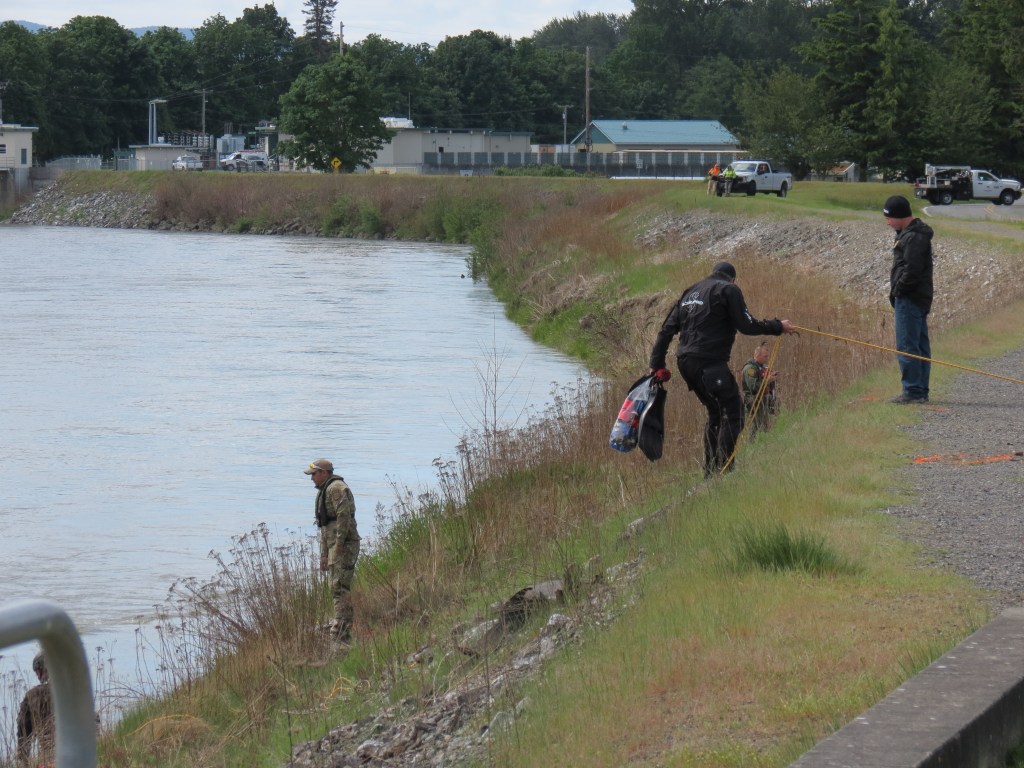 Scene of multi-agency response to recover vehicle that ended up submerged in the Nooksack River after leaving the road (May 18, 2021). Photo: Whatcom News
