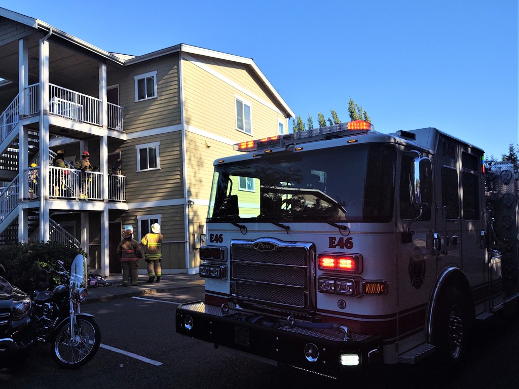 WCFD7 firefighters at the scene of an apartment fire (May 9, 2021). Photo: Whatcom News