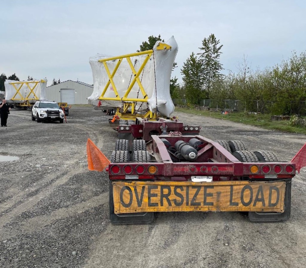WSP commercial vehicle enforcement conduct inspections of 2 "super loads" after 1 ended up blocking I-5 while unable to pass under an overpass (May 5, 2021). Photo courtesy of WSP