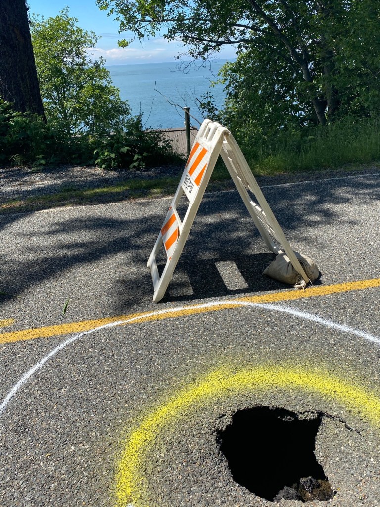 Sinkhole on West Shore Drive (May 25, 2021). Photo courtesy of Mike McKenzie