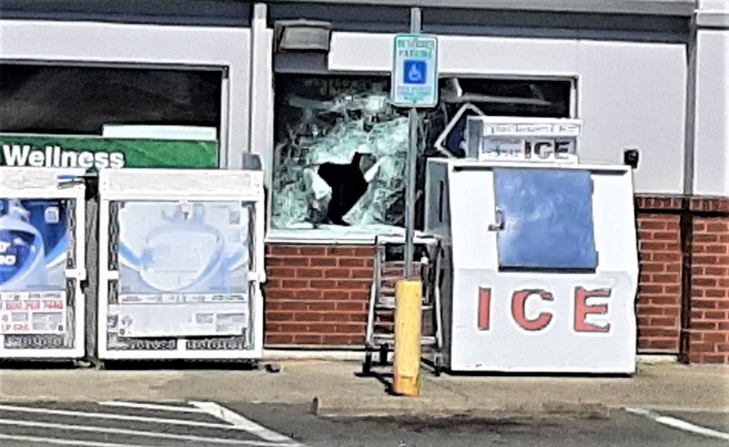 A hole used by burglars is visible in a window at a business on 3rd Avenue in Ferndale (June 25, 2021). Photo courtesy of a reader