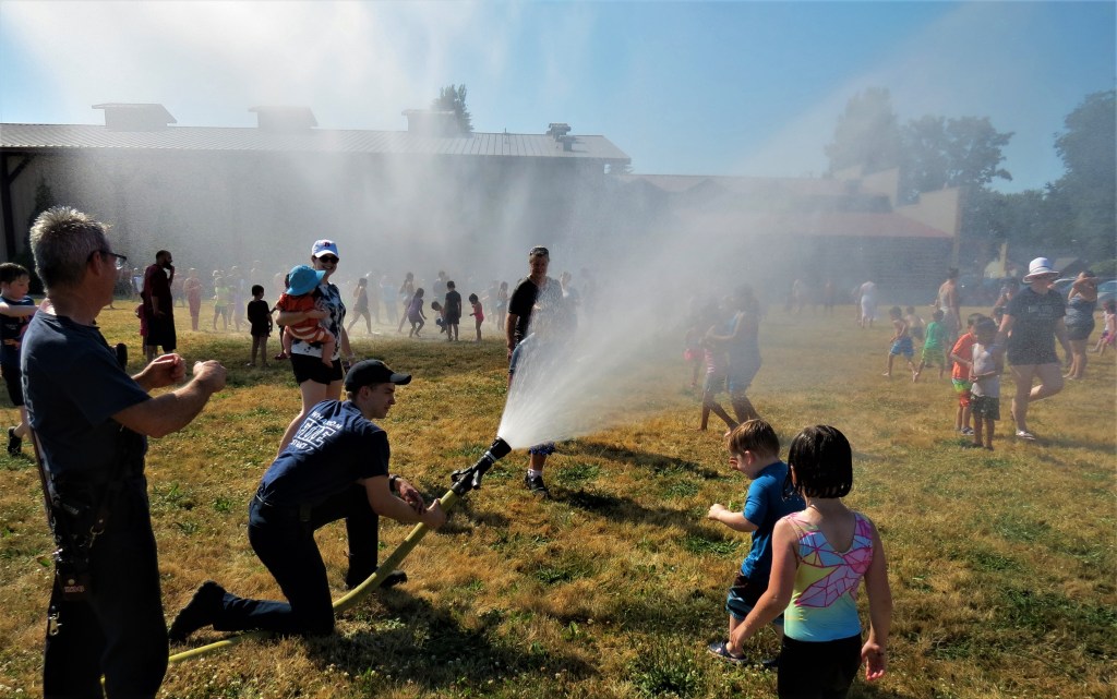 Whatcom County Fire District 7 crews provide a fun way to cool down at Pioneer Park in Ferndale during a heat wave (June 28, 2021). Photo: Whatcom News