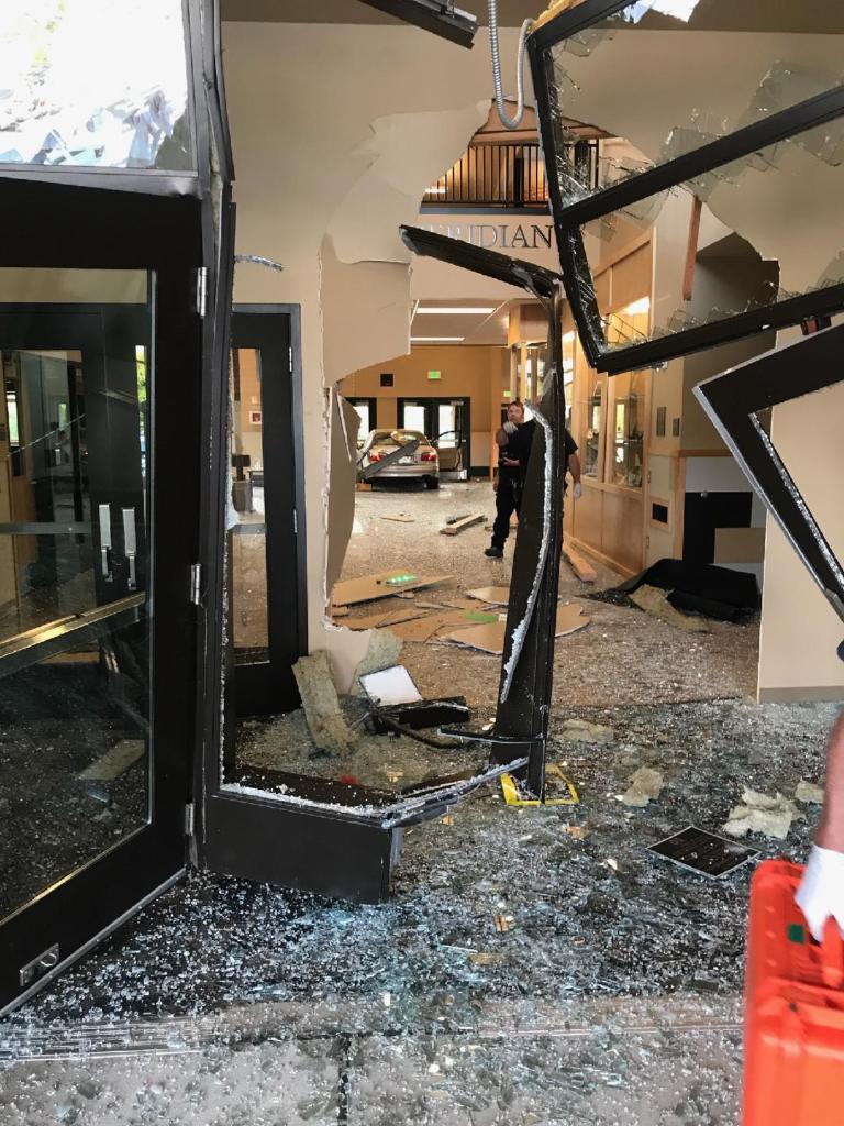 The scene after a car drove into a building on the Meridian High School campus (August 12, 2021). Photo courtesy of NWFR
