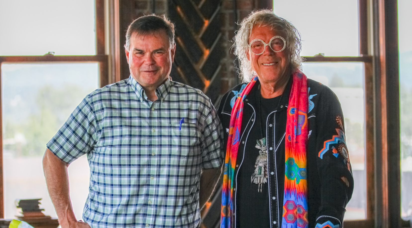 Ron Judd and David Syre pose in an undated photo. Photo courtesy of Cascadia News Company, LLC.