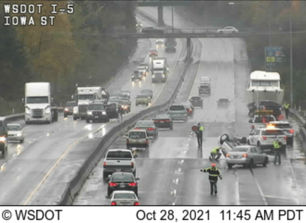 Scene of rollover crash on I-5 by Iowa Street (October 28, 2021). WSDOT traffic camera