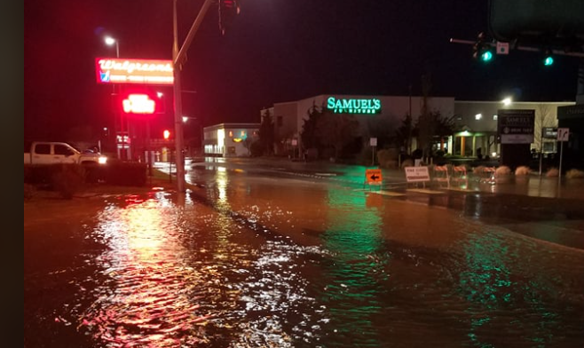 Floodwaters over Main Street looking west at Joe Moser Lane (November 16, 2021). Photo courtesy of Alyssa Springs