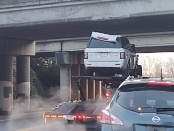 Truck towing a car hauler trailer after striking the I-5 and Portal Way overpass (December 3, 2021). Photo: Whatcom News