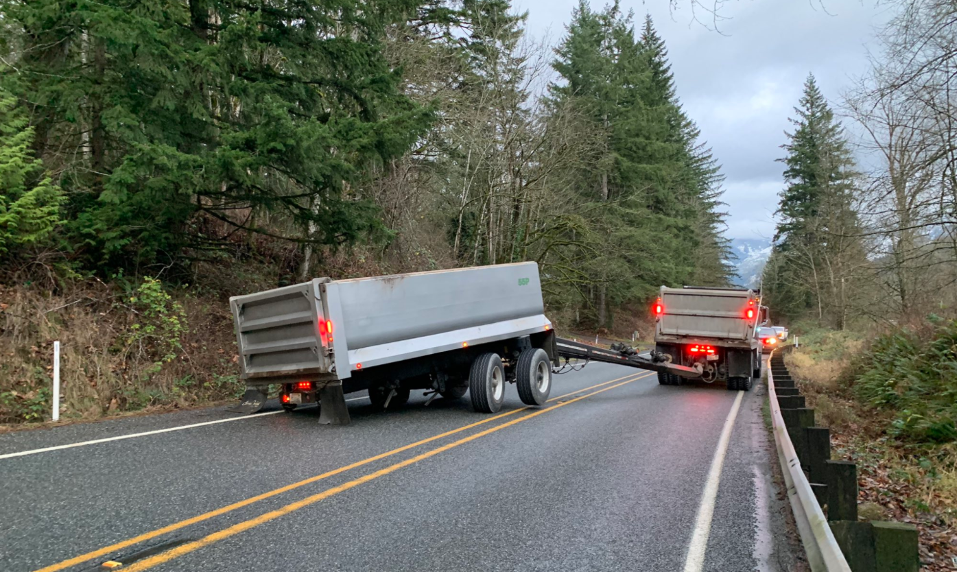 Scene of a crash involving a dump truck towing a trailer on Mt Baker Highway (December 16, 2021). Photo courtesy of WSP