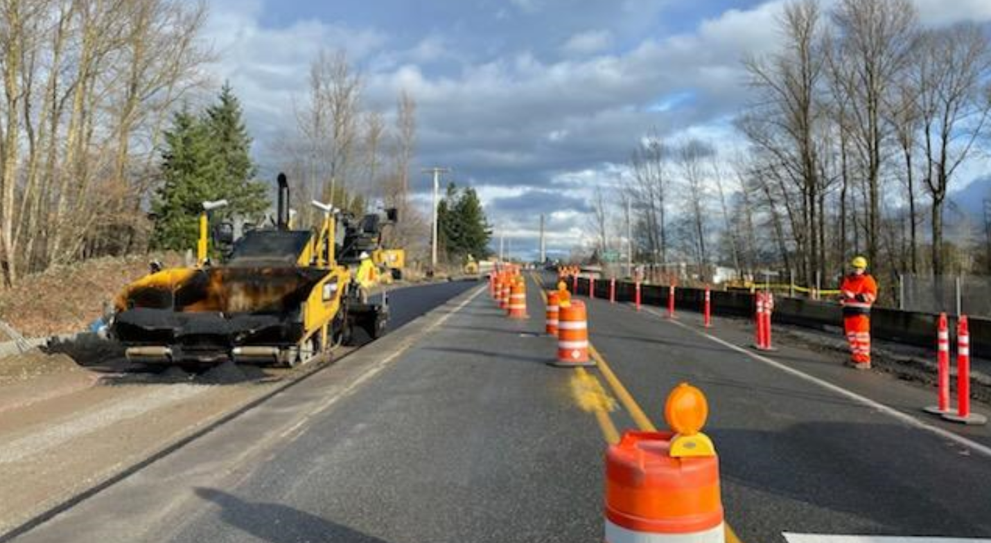 A Washington State Department of Transporation (WSDOT) contractor crew works to complete temporary realignment of the Everson Road bridge (SR544) damaged during the mid-November flooding events (December 22, 2021). Photo courtesy of WSDOT