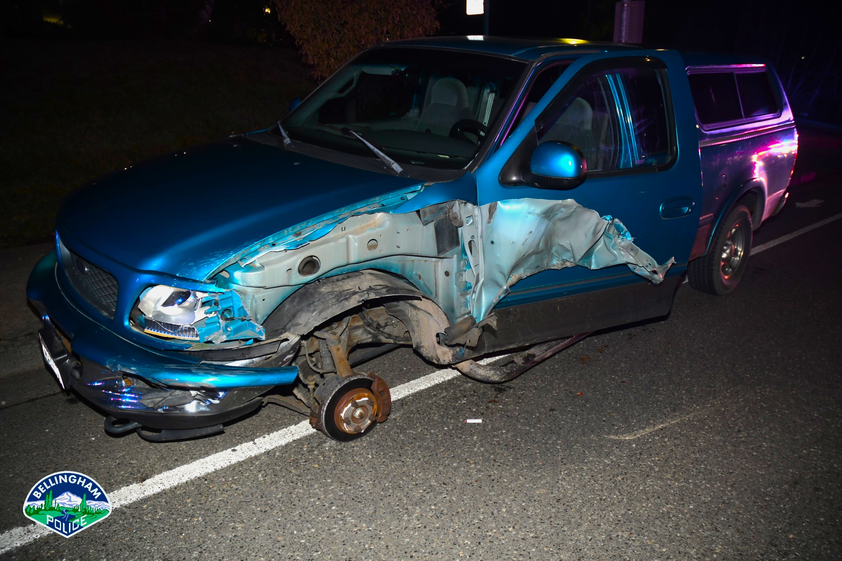 Damage visible following a crash involving a fleeing stolen pickup truck and a Bellingham Police Department patrol vehicle (March 3, 2022). Photo courtesy of BPD