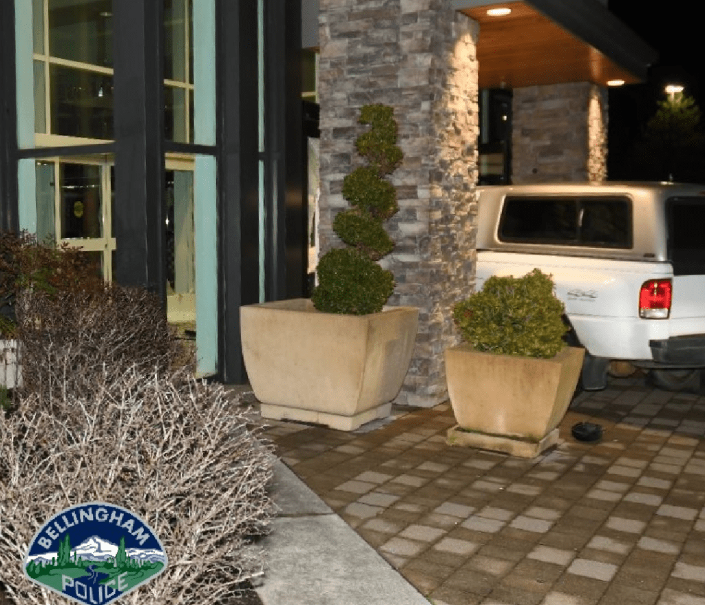 Truck seen at the east entrance to the food court at a Bellingham mall after a man attempted to elude law enforcement and then drove into the glass doors (March 12, 2022). Photo courtesy of the Bellingham Police Department