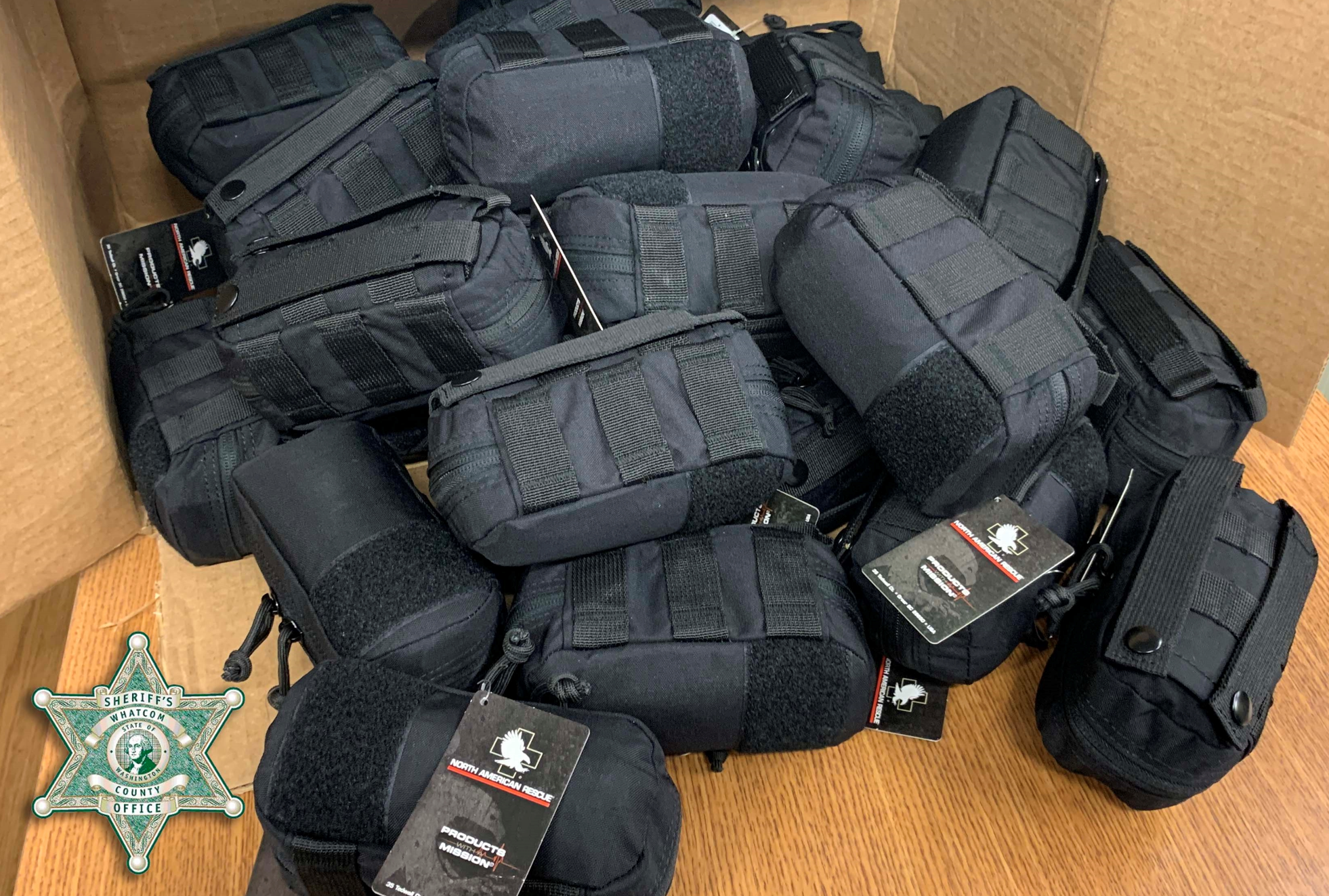 A donation of 60 trauma kits to the Whatcom County Sheriff's Office by the Foothills Community Alliance.