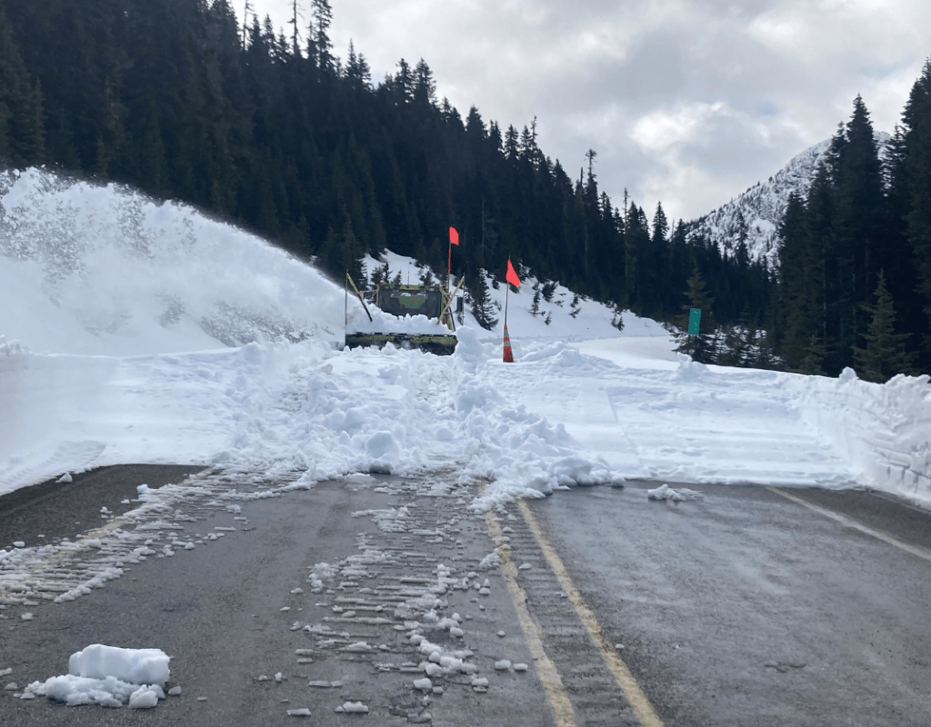 During the sixth week of the 2022 spring clearing on the North Cascades, Highway (SR20), eastside and westside crews met on the west side of Rainy Pass (May 6, 2022). Photo: WSDOT