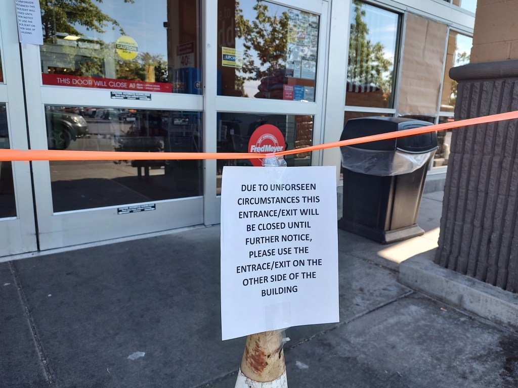 Scene after a glass window at a retail store was broken by someone throwing a rock (July 18, 2022). Photo: Whatcom News