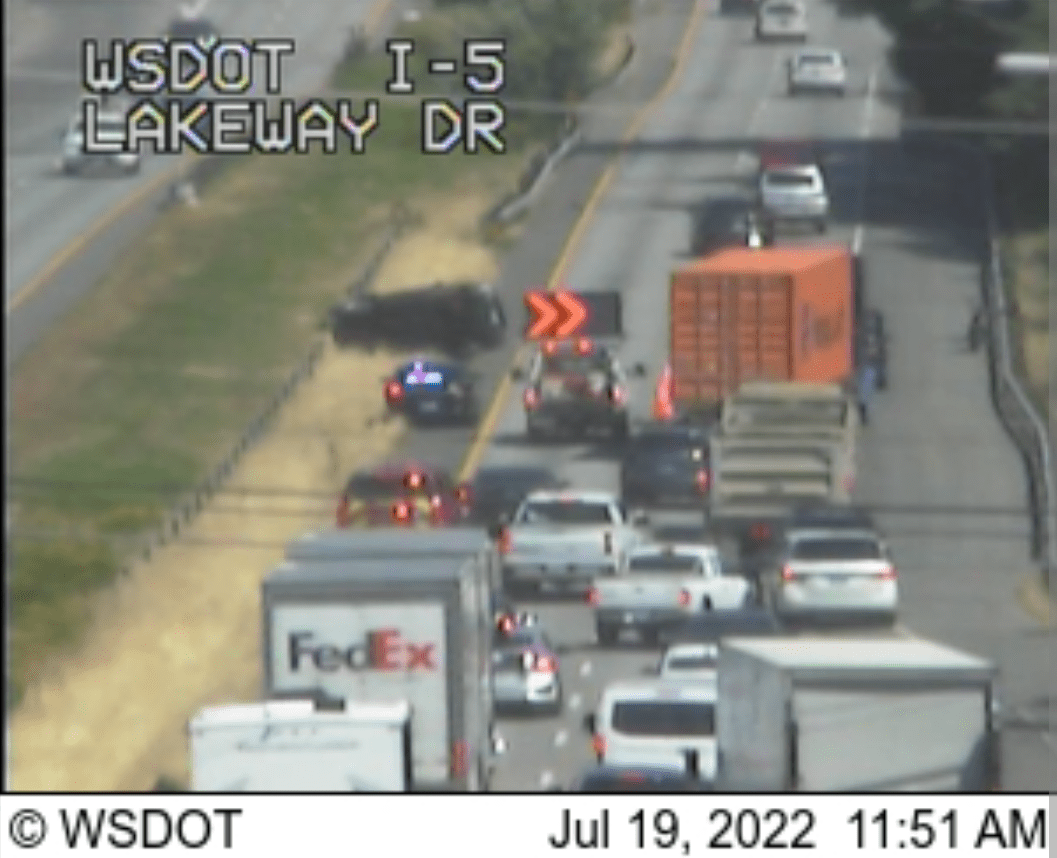 Scene of a single-vehicle rollover crash on northbound I-5 in Bellingham (July 19, 2022). Photo: WSDOT