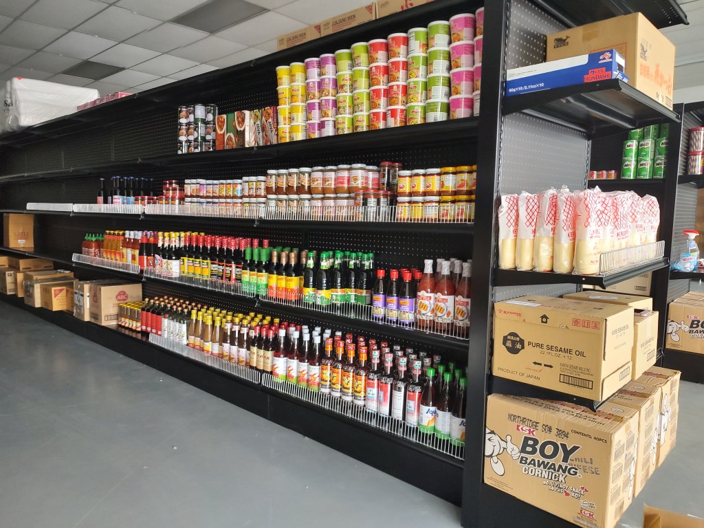 Shelves begin being stocked in preparation for the opening of Ferndale Asian Grocer (September 13, 2022). Photo: Whatcom News