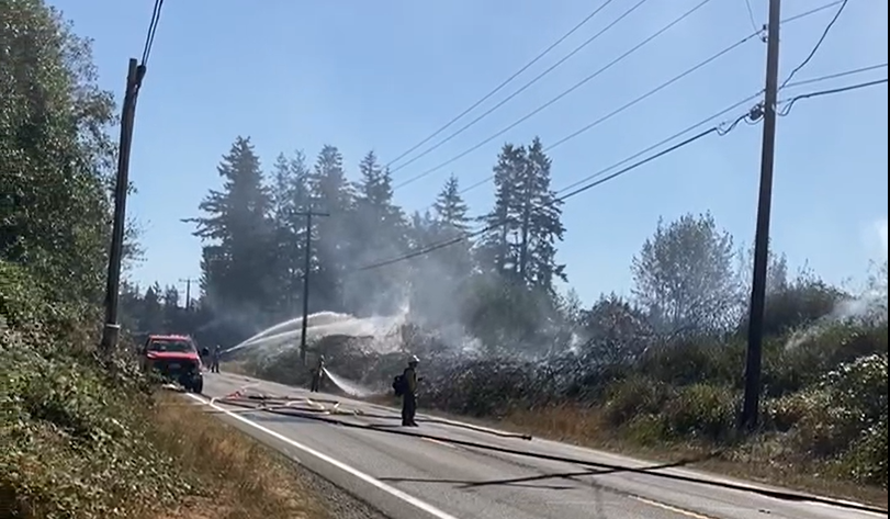 WCFD1 firefighters work to knock down an outside fire on Everson Goshen Road (September 7, 2022). Photo courtesy of Everson PD