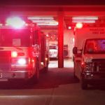 Whatcom Fire District 7 apparatus flash their red beacons at a fire station in memory of fallen firefighters (October 3, 2020). Photo courtesy of WCFD7