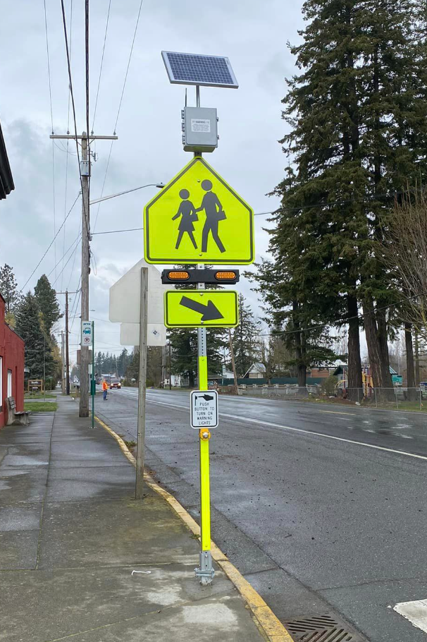 1 of 2 lighted crosswalk signs in place at the intersection of Nooksack Road and E Madison Street in Nooksack (March 21, 2023). Photo courtesy of City of Nooksack