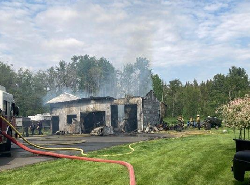Scene of a structure fire on Creasey Road (May 24, 2023). Photo courtesy of North Whatcom Fire & Rescue.