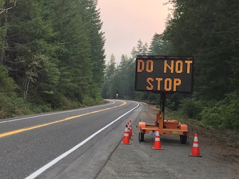 Electronic sign board in place on the North Cascades Highway (SR20) during firefighting efforts (August 4, 2023). Photo courtesy of WSDOT