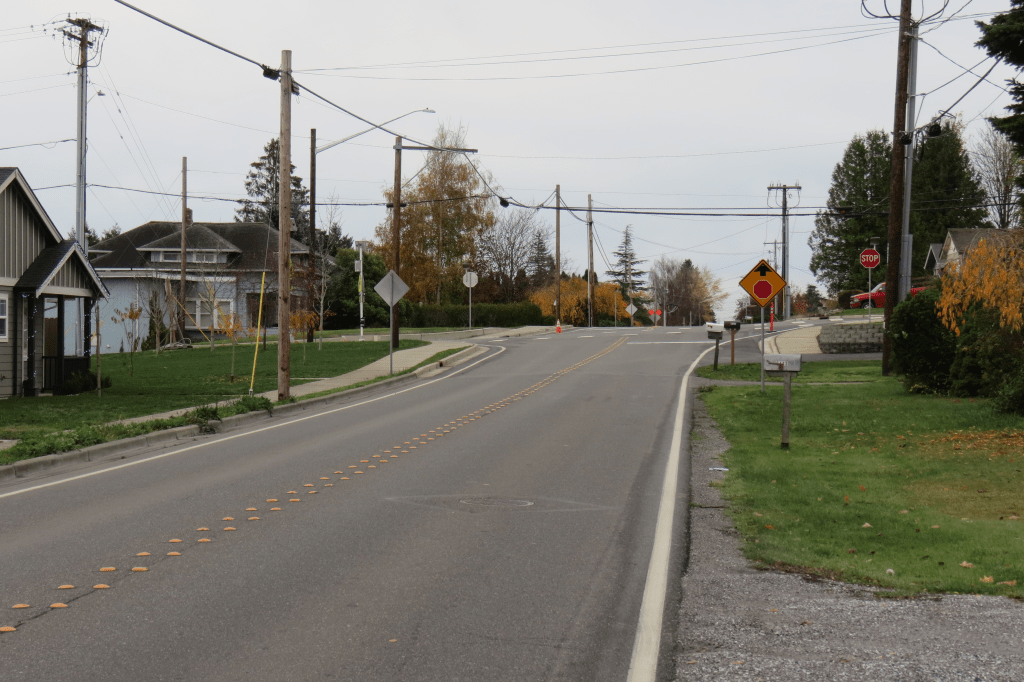 Looking south on Malloy Avenue toward the intersection with Thornton Street after new stop signs were installed (November 9, 2023). Photo: Whatcom News