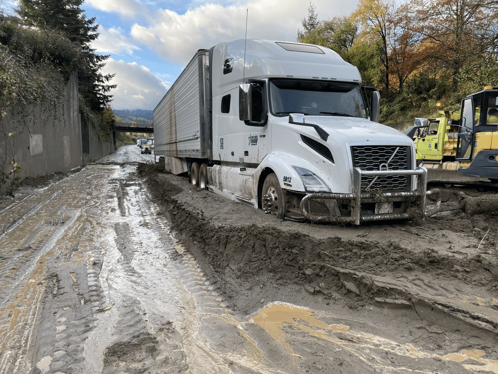 Semi-truck and trailer stuck in debris on I-5 in Bellingham (October 27, 2024). Photo: WSDOT